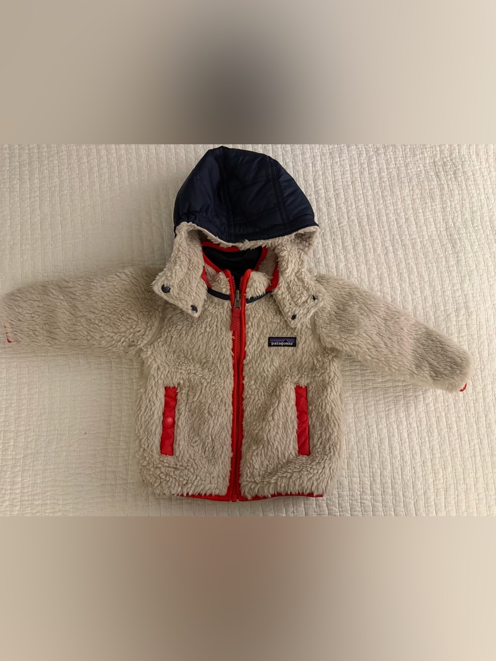 Patagonia Kids Cream Sherpa Jacket with Navy Hood and Red Accents